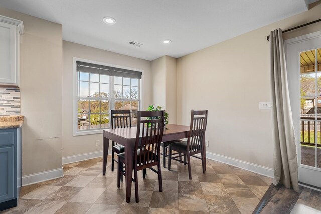 1277 Morstead Dr, Clarksville, TN 37042 - dining room featuring stone finish flooring, visible vents, recessed lighting, and baseboards