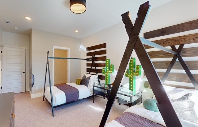 bedroom featuring baseboards, visible vents, light carpet, and recessed lighting