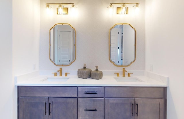 bathroom with double vanity and a sink