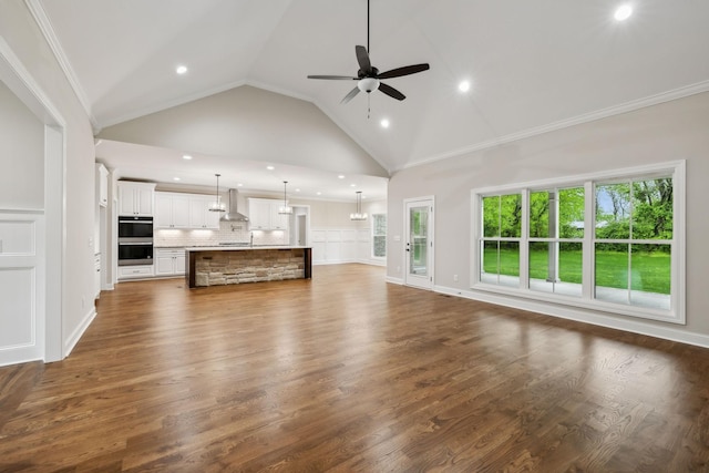 8020 Traditions Ln, Columbia, TN 38401 - unfurnished living room featuring recessed lighting, dark wood-style flooring, ceiling fan, high vaulted ceiling, and ornamental molding