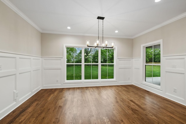 8020 Traditions Ln, Columbia, TN 38401 - unfurnished dining area featuring recessed lighting, a notable chandelier, dark wood-type flooring, a decorative wall, and ornamental molding