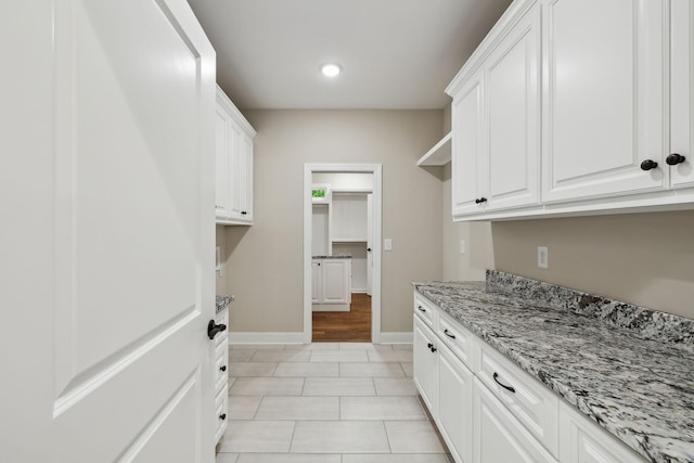 8020 Traditions Ln, Columbia, TN 38401 - washroom featuring baseboards, recessed lighting, and light tile patterned floors