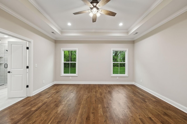 8020 Traditions Ln, Columbia, TN 38401 - spare room featuring wood finished floors, a healthy amount of sunlight, ceiling fan, and a tray ceiling