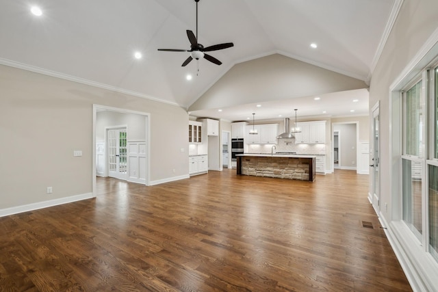 8020 Traditions Ln, Columbia, TN 38401 - unfurnished living room with recessed lighting, ceiling fan, visible vents, ornamental molding, and dark wood finished floors