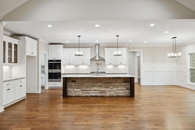 8020 Traditions Ln, Columbia, TN 38401 - kitchen with white cabinets, backsplash, wall chimney exhaust hood, and double oven