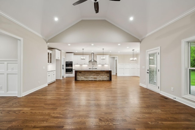 8020 Traditions Ln, Columbia, TN 38401 - unfurnished living room with a sink, ceiling fan, dark wood-style flooring, recessed lighting, and high vaulted ceiling