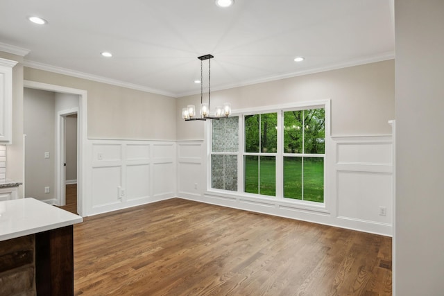 8020 Traditions Ln, Columbia, TN 38401 - unfurnished dining area featuring recessed lighting, wood finished floors, crown molding, and a decorative wall