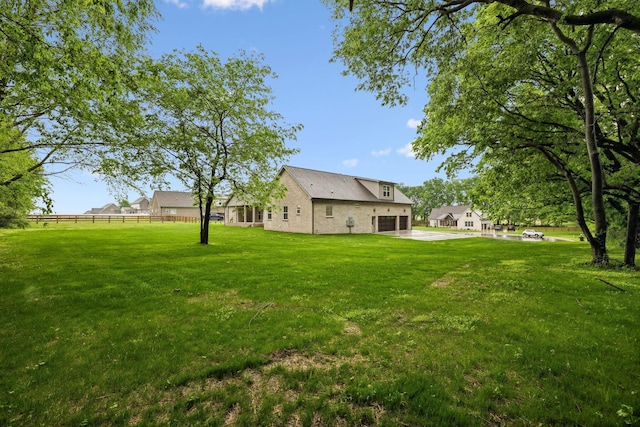 8020 Traditions Ln, Columbia, TN 38401 - view of yard with a garage and fence