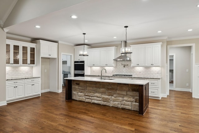 8020 Traditions Ln, Columbia, TN 38401 - kitchen with stainless steel gas cooktop, a sink, multiple ovens, wall chimney exhaust hood, and backsplash