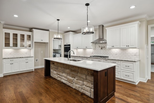 8020 Traditions Ln, Columbia, TN 38401 - kitchen with crown molding, a sink, stainless steel appliances, wall chimney exhaust hood, and backsplash
