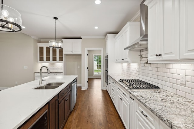 8020 Traditions Ln, Columbia, TN 38401 - kitchen with white cabinetry, wall chimney exhaust hood, appliances with stainless steel finishes, and a sink