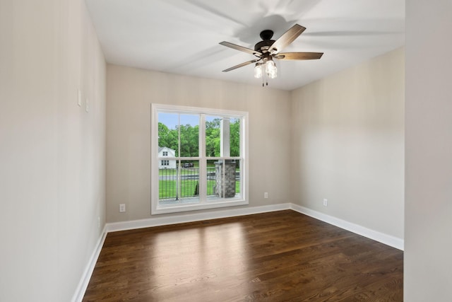 8020 Traditions Ln, Columbia, TN 38401 - spare room featuring a ceiling fan, dark wood-style floors, and baseboards
