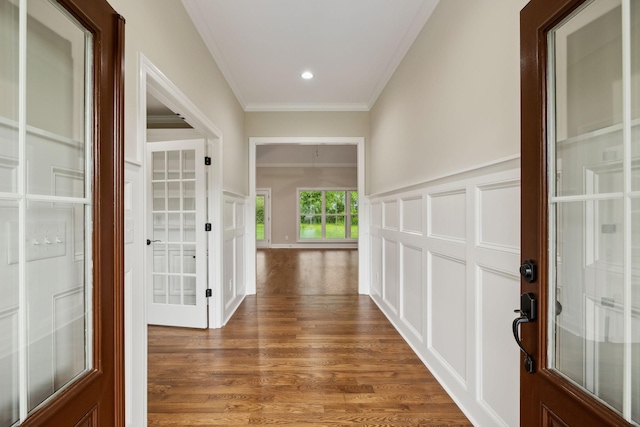 8020 Traditions Ln, Columbia, TN 38401 - entryway featuring wood finished floors, crown molding, a wainscoted wall, a decorative wall, and french doors