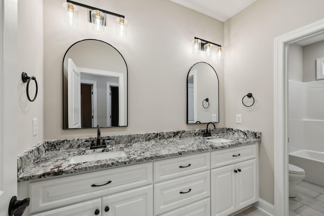 8020 Traditions Ln, Columbia, TN 38401 - bathroom with a bathing tub, double vanity, and a sink