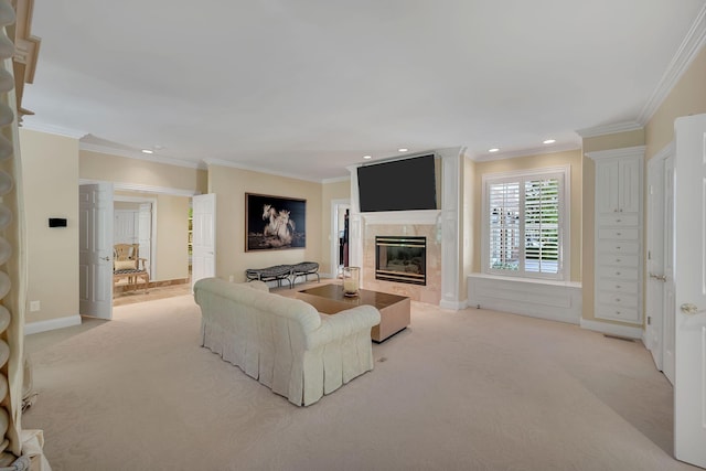 living area with a high end fireplace, recessed lighting, crown molding, and light carpet