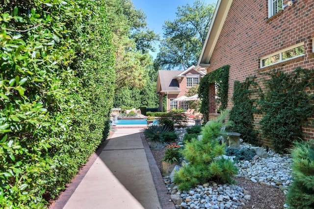 exterior space with an outdoor pool