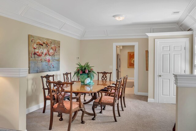 dining room featuring baseboards, light carpet, and crown molding