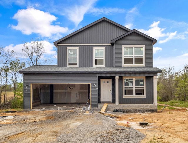 500 Herman Dr, Clarksville, TN 37042 - view of front facade with driveway, a garage, covered porch, and a shingled roof