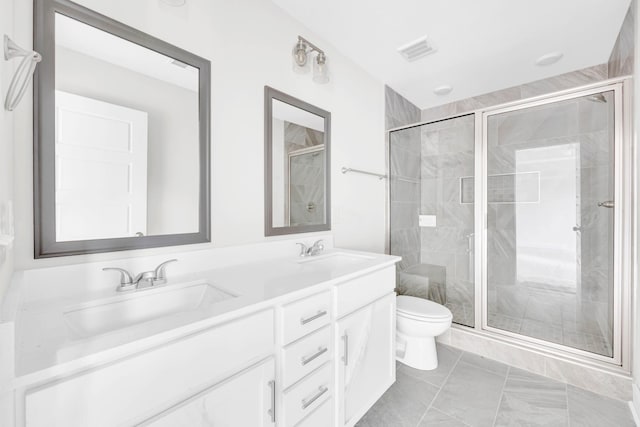500 Herman Dr, Clarksville, TN 37042 - bathroom featuring toilet, a shower stall, and double vanity