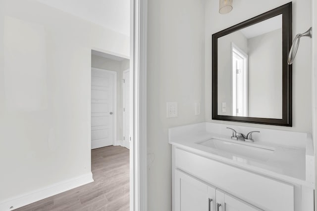 500 Herman Dr, Clarksville, TN 37042 - bathroom with wood finished floors, vanity, and baseboards