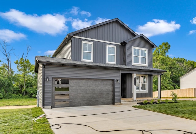 500 Herman Dr, Clarksville, TN 37042 - view of front of home featuring concrete driveway, a porch, and an attached garage