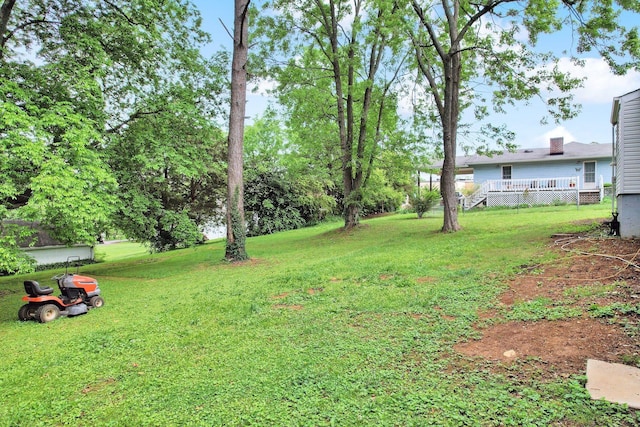 view of yard with a deck