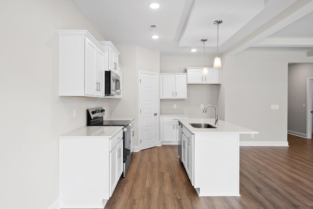 465 Herman Dr, Clarksville, TN 37042 - kitchen featuring a kitchen island with sink, stainless steel appliances, decorative light fixtures, a sink, and dark wood-type flooring