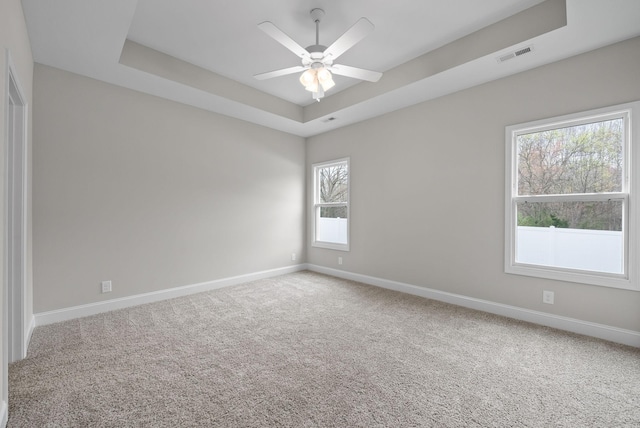 465 Herman Dr, Clarksville, TN 37042 - carpeted spare room with visible vents, ceiling fan, a raised ceiling, and baseboards