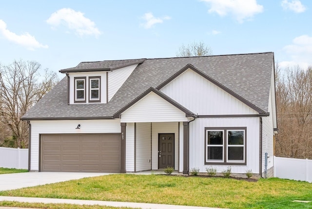 465 Herman Dr, Clarksville, TN 37042 - view of front of property featuring fence, a shingled roof, a front yard, and concrete driveway