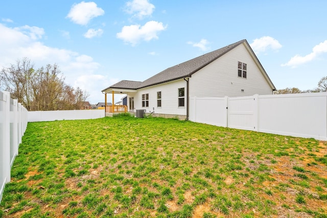 465 Herman Dr, Clarksville, TN 37042 - back of house with a gate, ceiling fan, a lawn, central AC, and a fenced backyard