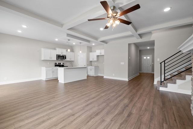 465 Herman Dr, Clarksville, TN 37042 - unfurnished living room with baseboards, recessed lighting, ceiling fan, and beam ceiling
