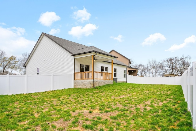 465 Herman Dr, Clarksville, TN 37042 - back of property featuring a yard, ceiling fan, and a fenced backyard
