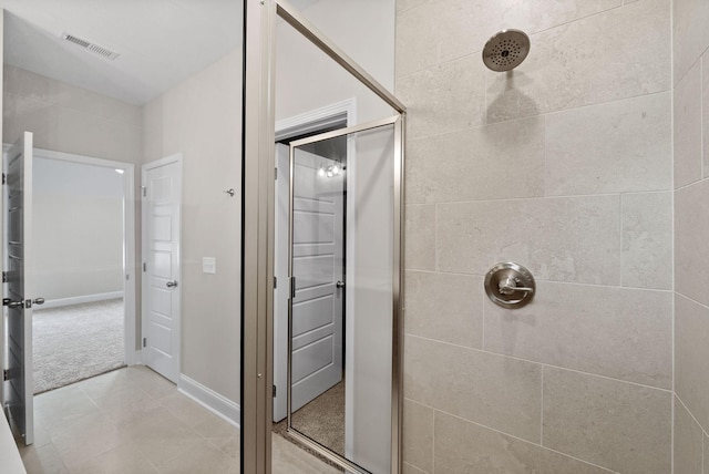 465 Herman Dr, Clarksville, TN 37042 - full bathroom featuring visible vents, baseboards, tile patterned flooring, and tiled shower
