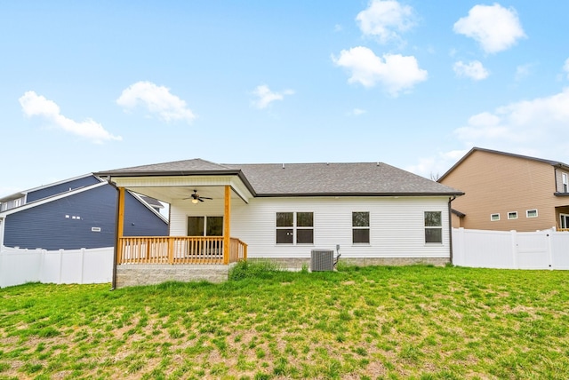 465 Herman Dr, Clarksville, TN 37042 - back of property featuring a fenced backyard, a yard, ceiling fan, central air condition unit, and roof with shingles
