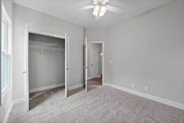 465 Herman Dr, Clarksville, TN 37042 - unfurnished bedroom with a closet, baseboards, a ceiling fan, and carpet floors