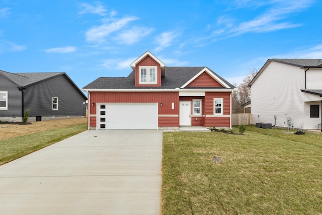 1005 Cherry Acres Dr, Clarksville, TN 37042 - view of front of house with driveway, roof with shingles, a front lawn, and an attached garage