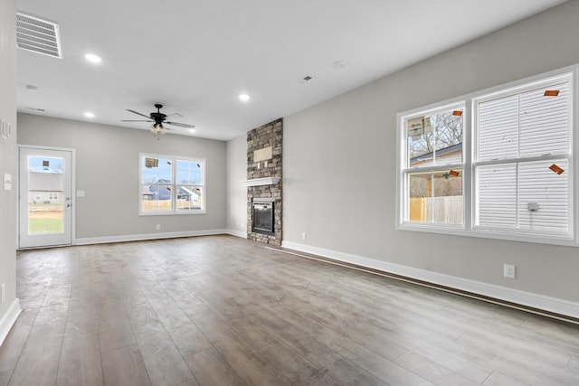 1005 Cherry Acres Dr, Clarksville, TN 37042 - unfurnished living room with a ceiling fan, visible vents, wood finished floors, and baseboards
