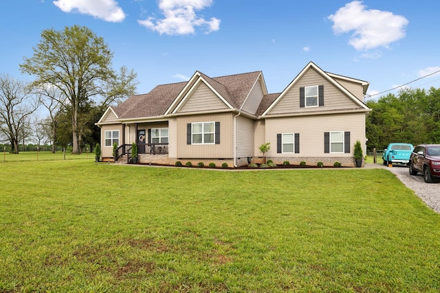craftsman inspired home with a front lawn, crawl space, and covered porch
