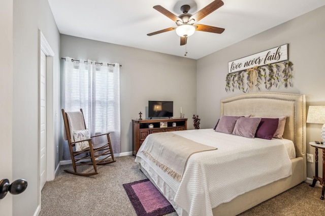 bedroom with baseboards, multiple windows, and carpet flooring