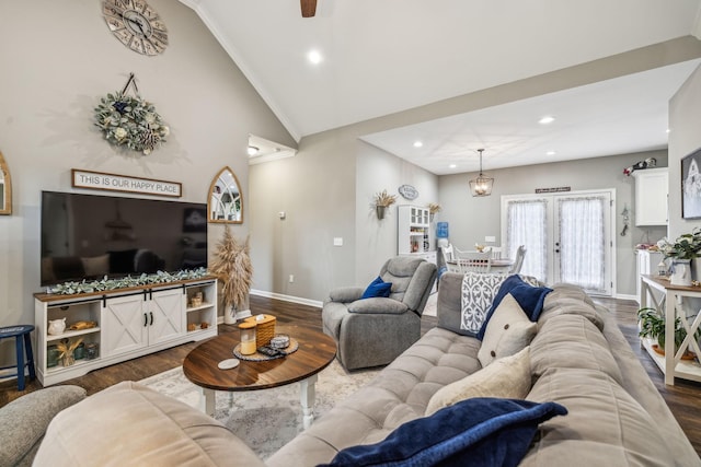 living room with lofted ceiling, recessed lighting, dark wood finished floors, and baseboards