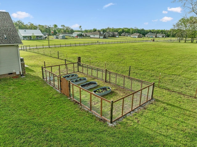 view of yard featuring a garden and fence