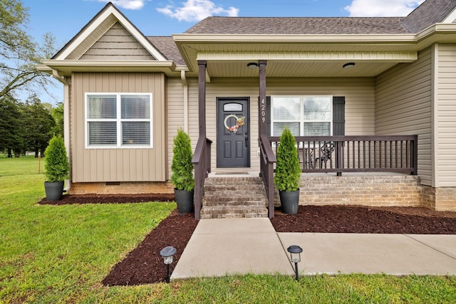 exterior space featuring a yard, crawl space, a porch, and roof with shingles