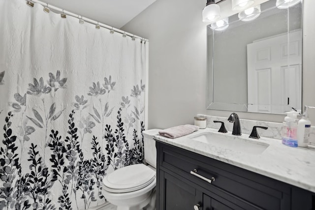 full bath featuring toilet, a shower with curtain, and vanity