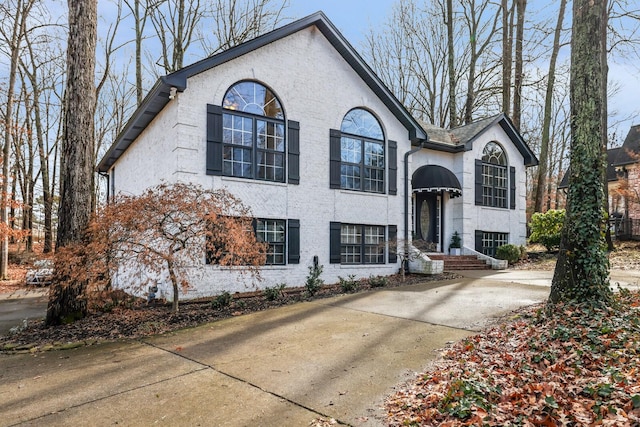 bi-level home with stucco siding
