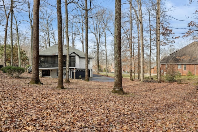 view of yard featuring a sunroom