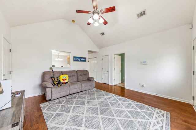 living area with a ceiling fan, visible vents, high vaulted ceiling, and baseboards