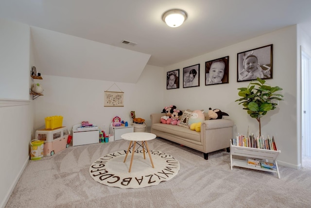 game room featuring lofted ceiling, visible vents, carpet floors, and baseboards