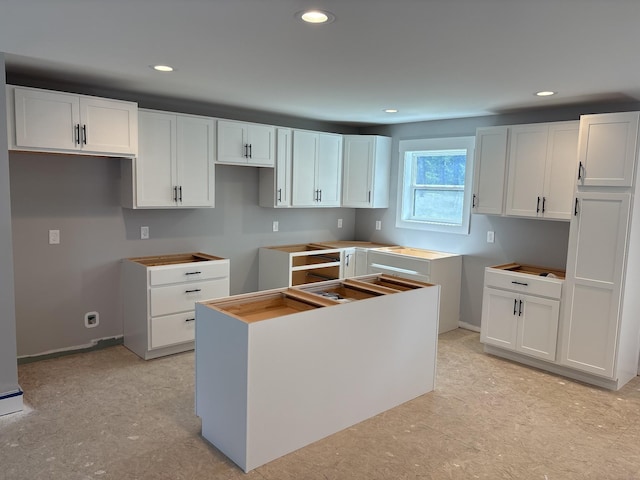 116 Carter Blake Rd, Tullahoma, TN 37388 - kitchen with a center island, recessed lighting, white cabinets, and light flooring