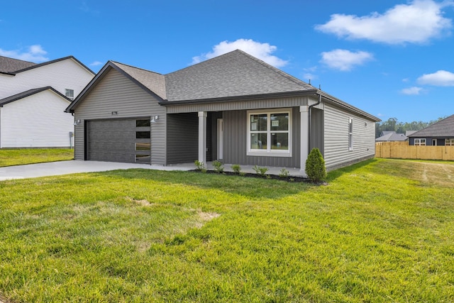 346 Galway Dr, Clarksville, TN 37042 - view of front of property with a shingled roof, a garage, driveway, board and batten siding, and a porch