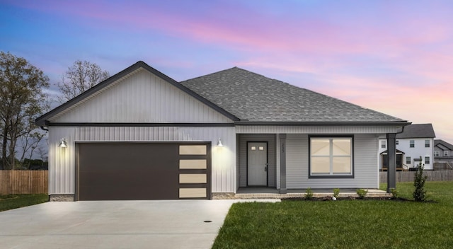 235 Donegal Dr, Clarksville, TN 37042 - view of front of property with concrete driveway, a shingled roof, covered porch, an attached garage, and fence
